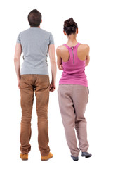 Back view of couple. beautiful friendly girl and guy together.