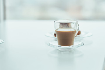 cup of coffee on table