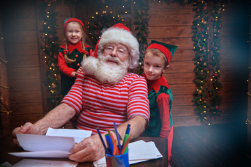 funny elves with Santa