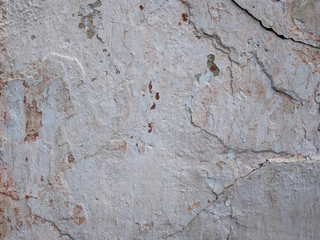 atmospheric background texture of cracked stucco
