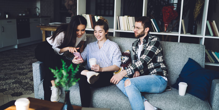 Friends Relaxing In Cozy Modern Small Apartment