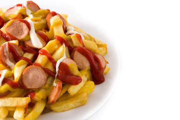 Typical Latin America Salchipapa. Sausages with fries, ketchup, mustard and mayo  isolated on white background. Copy space