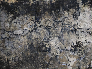 atmospheric background texture of cracked stucco