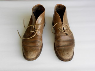 old leather shoes on a white background