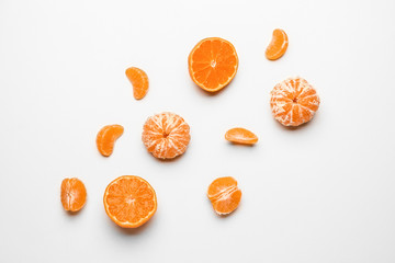 Sweet tangerines on white background
