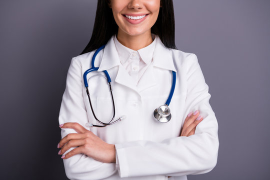 Cropped photo of brown hair experienced girl doctor work in hospital cross hands ready consult patients wear stethoscope white coat isolated over grey color background