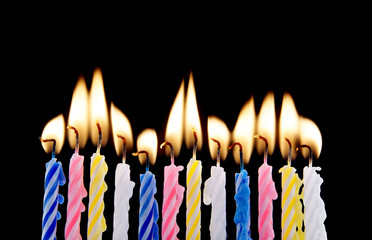 Birthday candles on black background