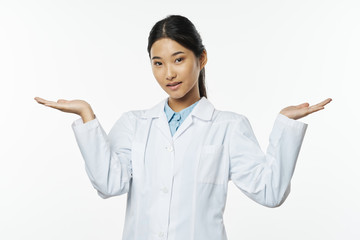 portrait of young woman pointing at the camera