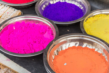 Traditional indian color powder for sale at a market in Orchha, India