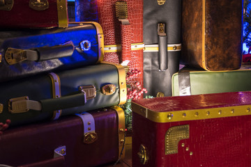 Fototapeta na wymiar old suitcase with Christmas accessories