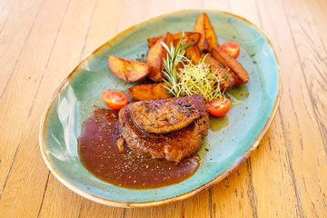 Steak on a restaurant table