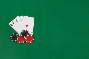 four aces and poker chips