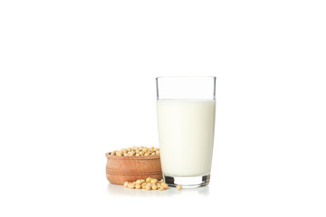 Glass soy milk and soybeans isolated on white background