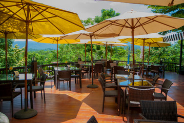 table and chairs on the beach, table in the resort