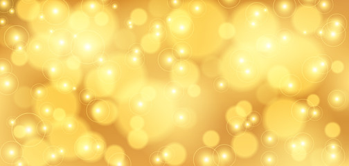 Golden bokeh background. Christmas glowing lights with sparkles. Holiday decorative effect.