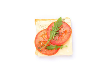 Toast with cheese, tomato and arugula isolated on white background