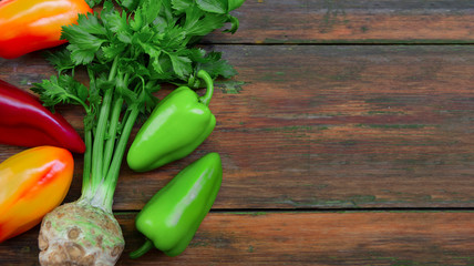 Organic vegetables from garden on wooden background