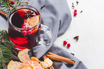 Cup of tasty mulled wine on table