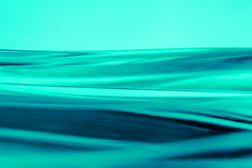 Abstract blurred soft focused futuristic wavy background. Trendy mint color concept.