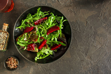 salad beetroot, leaf mix (beet, lettuce, arugula, red chard and more) menu concept. food background. top view. copy space