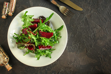 salad beetroot, leaf mix (beet, lettuce, arugula, red chard and more) menu concept. food background. top view. copy space