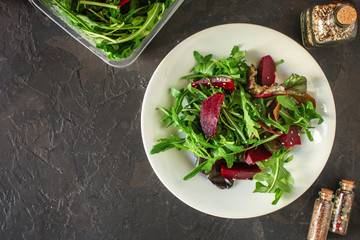 salad beetroot, leaf mix (beet, lettuce, arugula, red chard and more) menu concept. food background. top view. copy space