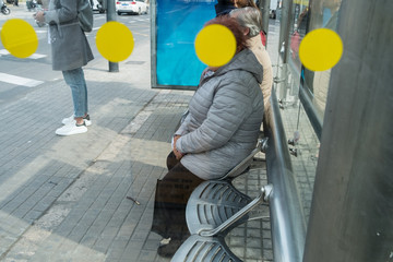  image of bus stop with yellow dots of the stop on the face of a person
