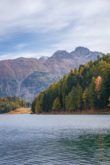 Lake Sankt Moritz, the Alps and nature near the village of Sankt Moritz, Switzerland - October 2019.