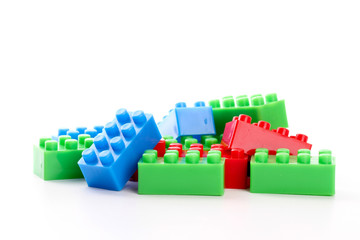 Plastic toy block over white background