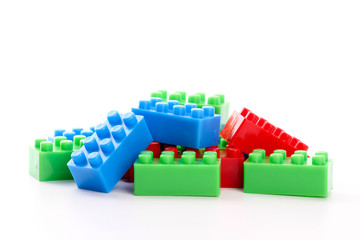 Fototapeta premium Plastic toy block over white background