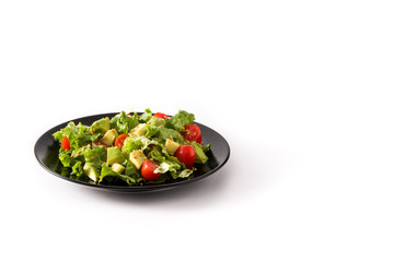 Salad with avocado, lettuce, tomato, flax seeds isolated on white background. Copy space