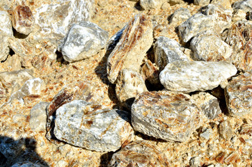 Natural gray gypsum stone. Close up image of stones with black and white. Industrial mining area. Limestone mining, quarry - Image