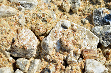 Natural gray gypsum stone. Close up image of stones with black and white. Industrial mining area. Limestone mining, quarry - Image