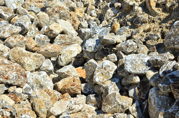 Natural gray gypsum stone. Close up image of stones with black and white. Industrial mining area. Limestone mining, quarry - Image