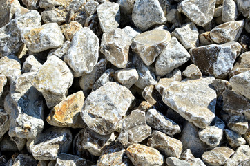 Natural gray gypsum stone. Close up image of stones with black and white. Industrial mining area. Limestone mining, quarry - Image