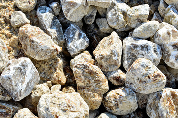 Natural gray gypsum stone. Close up image of stones with black and white. Industrial mining area. Limestone mining, quarry - Imagen