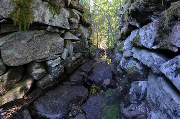 Ruins of an old mill covered with wood. Norway