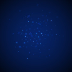 Fototapeta premium Sparse glowing snow Christmas background. Subtle f