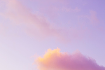 Fototapeta na wymiar evening cumulus clouds in pastel tones