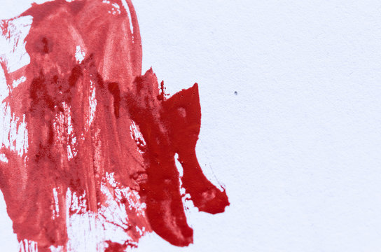 Stroke the Red Paint on the white canvas. Art process.