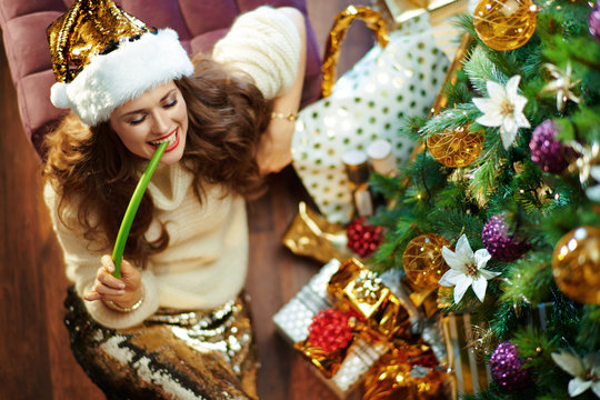 Happy Modern 40 Year Old Woman Eating Celery