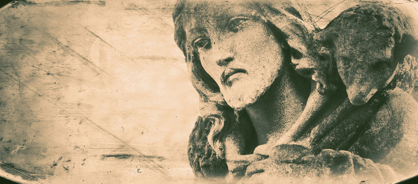 Retro styled image of ancient statue of Jesus Christ - the Good Shepherd