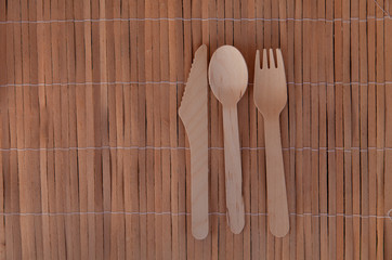 Eco paper utensils with cardboard, paper, wood. On an old wooden table, concept of zero plastic.