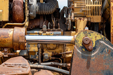 hydraulic pipe of the old tractor and engine background