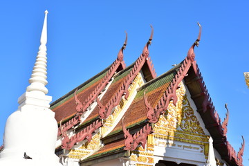 Golden statue of buddha in temple, Thailand	