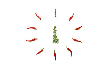 Abstract Christmas background in the form of a clock and a fir tree made of rosemary and chili pepper on a white background. Food concept, Christmas minimalism