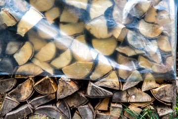 Chopped wood stacked in rows