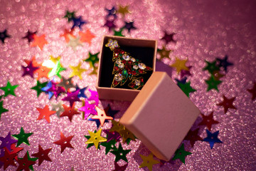 christmas tree shaped brooch in a gift box