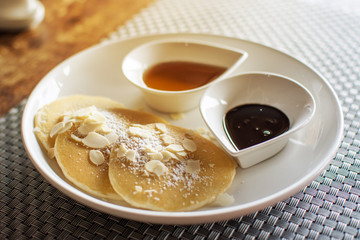 Pancakes with Butter and Syrup for Breakfast