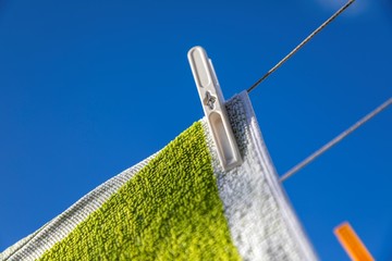 Laundry is drying outside on sunny day